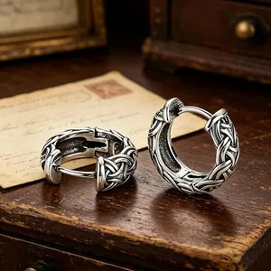 Celtic Knot Huggie Earrings, stainless steel, another view