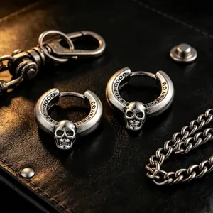 Skull Huggie Earrings, stainless steel, another view